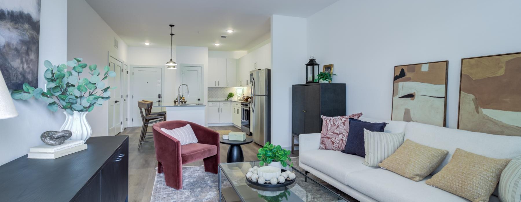 a living room with a couch and a table
